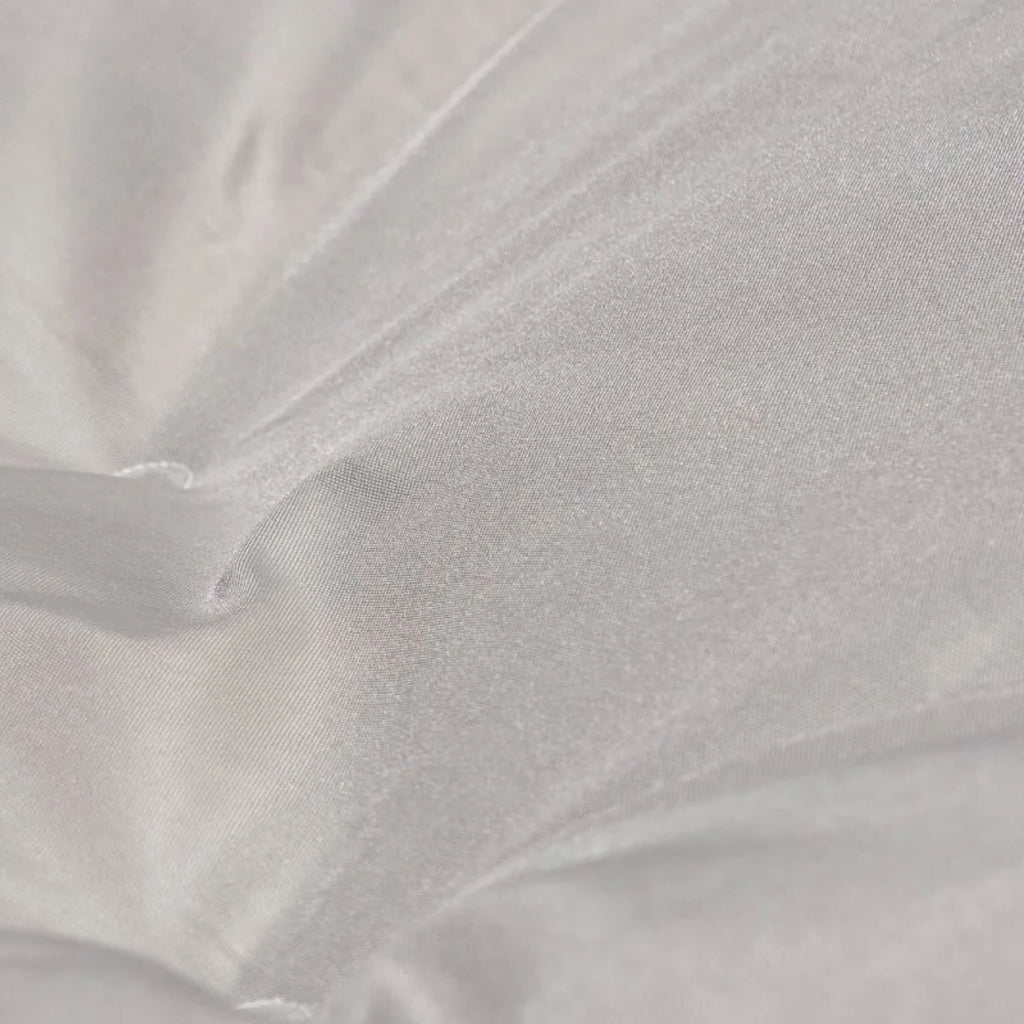 Zoom sur la matière du hamac sur pied beige XL, modèle Aura de Hamacio